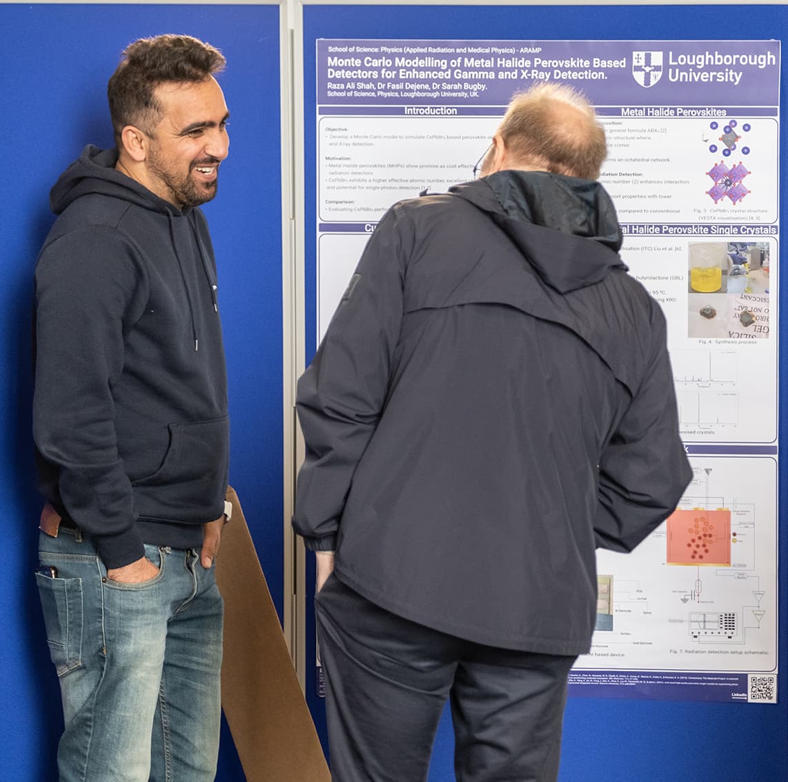 Raza presenting his poster